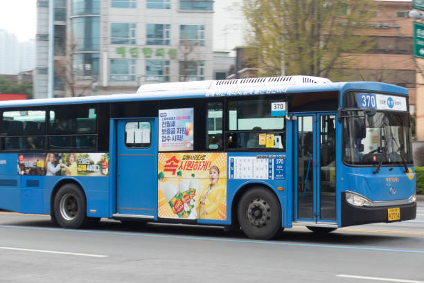Seoul City Bus Seoul, South Korea-March 31, 2020: Seoul city bus running in Gil-dong, Gangdong-gu seoul bus stock pictures, royalty-free photos & images