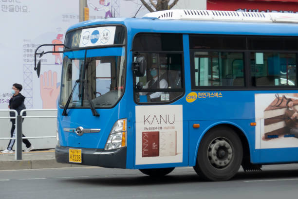 Seoul City Bus Seoul, South Korea-March 31, 2020: Seoul city bus running in Gil-dong, Gangdong-gu seoul bus stock pictures, royalty-free photos & images