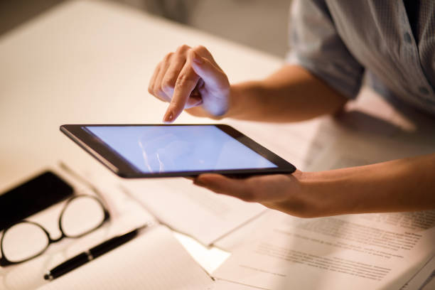 istock Close up of unrecognizable businesswoman using digital tablet 1217141977