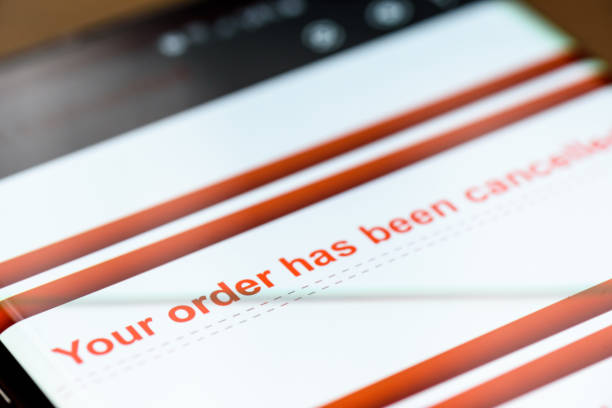 istock your order has been cancelled text on smart phone screen 1217153206