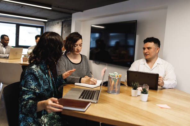 istock Diverse team members developing diverse business strategies 1217153310