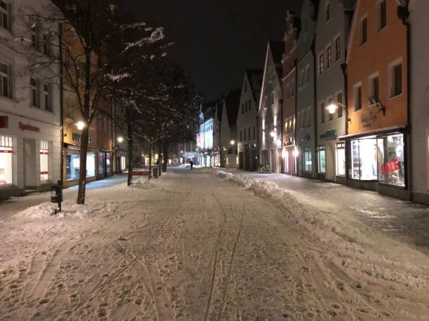 Weiden, Germany, February 5, 2019 - Snow-covered streets  Weiden in the Upper Palatinate, some unidentified people in the background.