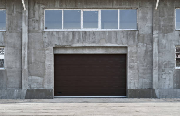 istock roller garage doors or sliding gates, construction or renovation of a garage or industrial building 1217156701