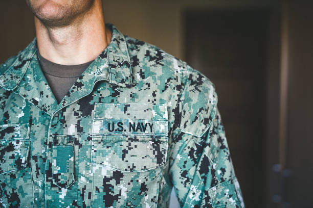 The heart of a hero Cropped shot of a soldier wearing camouflage fatigues with badges attached to it combat infantry badge stock pictures, royalty-free photos & images