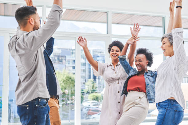 istock Working effectively as a team creates momentum and improves morale 1217159122