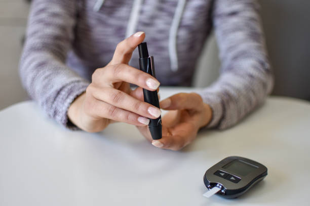 istock Diabetes doing blood glucose measurement 1217160334