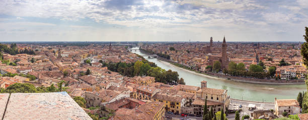 View  of the Adige River and the old town of Verona from the observation point Punto panoramico Castel S. Pietro located on the square Piazzale Castel S. Pietro in Verona, Italy View of the Adige River and the old town of Verona from the observation point Punto panoramico Castel S. Pietro located on the square Piazzale Castel S. Pietro punto stock pictures, royalty-free photos & images