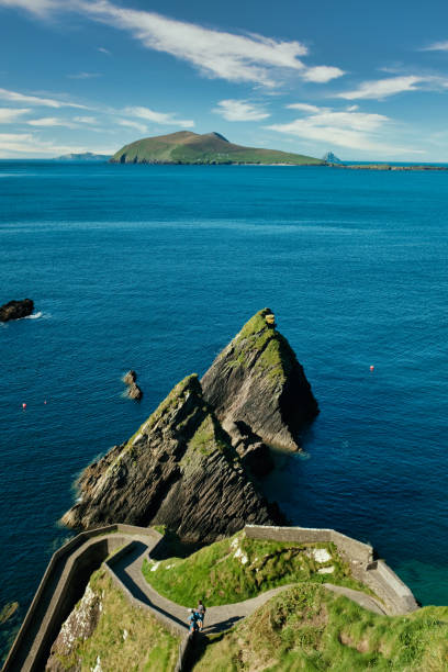 Dunquin Pier in the Dingle Peninsula Iconic Irish pier. Ireland, County Kerry, Dingle Peninsula, Dunquin Harbour dingle bay stock pictures, royalty-free photos & images