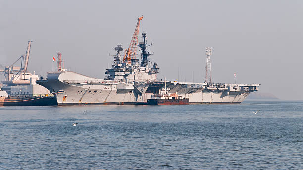 Ship, aircraft carrier docked in Mumbai, far shot  landing craft stock pictures, royalty-free photos & images