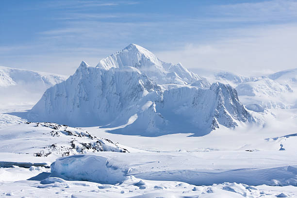 snowy peaks mountain peak is covered with white snow in Antarctica icecap photos stock pictures, royalty-free photos & images
