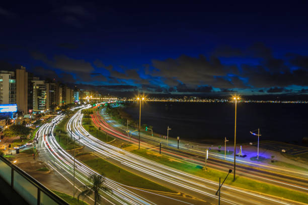 istock Night shot on the coastal road in Florianopolis 1217166537