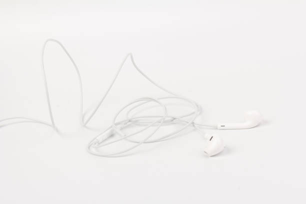 istock White headphones with headset on white isolated background 1217170690