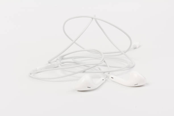 istock White headphones with headset on white isolated background 1217171213