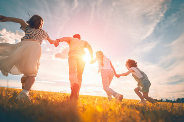 istock Happy family on autumn walk 1217171373