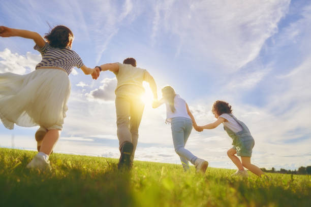 istock Happy family on autumn walk 1217171389