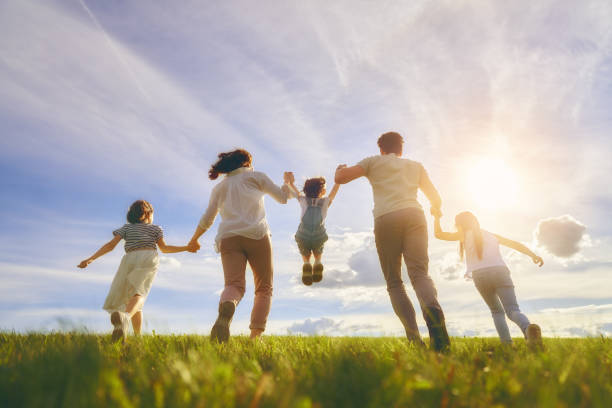 istock Happy family on autumn walk 1217171502