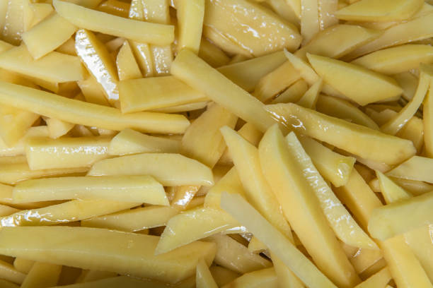 istock Chopped, sliced fresh potatoes cut as a background 1217171522