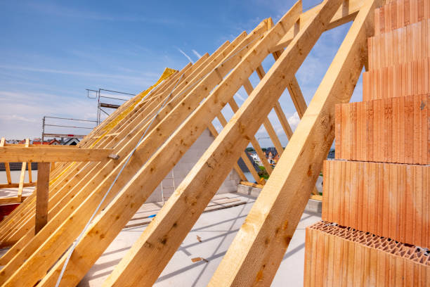 istock Roof beams on an unfinished building in construction 1217173461