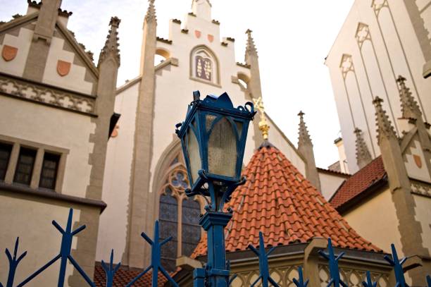 istock Isolated blue street lantern in front of a synagogue (Prague, Czech Republic, Europe) 1217173745