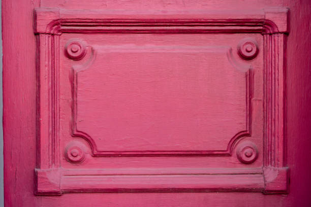 istock Trim Texture on Pink Door 1217173892