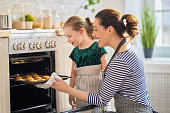 family are preparing bakery together