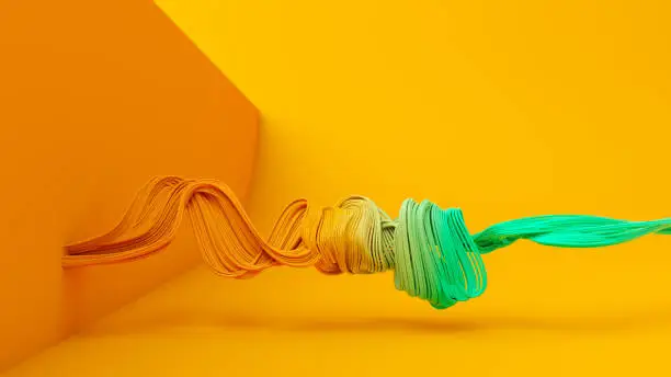 Abstract background of yellow and green twisting cables