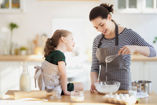 istock family are preparing bakery together 1217178424