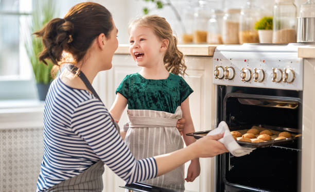 istock family are preparing bakery together 1217178439