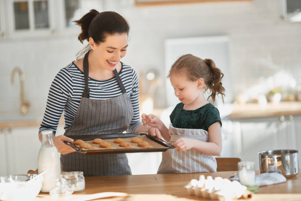 istock family are preparing bakery together 1217178555