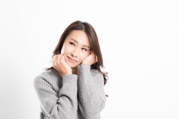 istock Woman portrait wearing a gray sweater. 1217178603