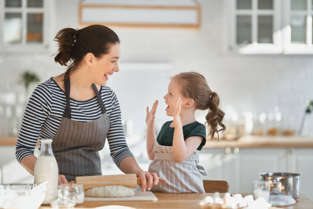 istock family are preparing bakery together 1217178628