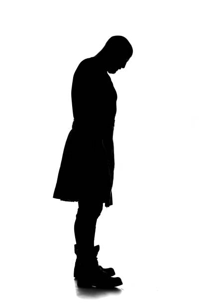 istock Male Silhouette wearing a kilt and boots 1217180830