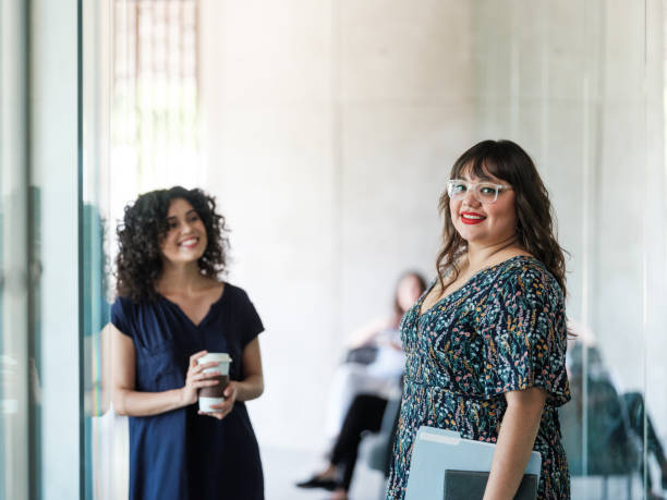 istock Confident young latin woman looking at camera and smiling 1217180885