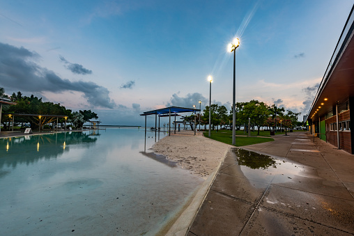 address:52/54 Esplanade, Cairns City QLD 4870, Australia.\nView of Cairns Esplanade Lagoon, a large free public pool next to the beach in Cairns, Queensland, Australia.