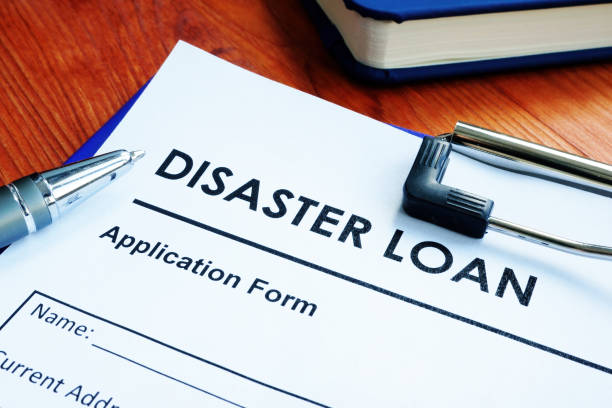 istock SBA disaster loan application form on the wooden surface. 1217182811