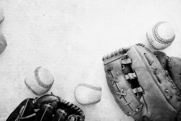 istock Baseballs and gloves with vintage texture 1217183384