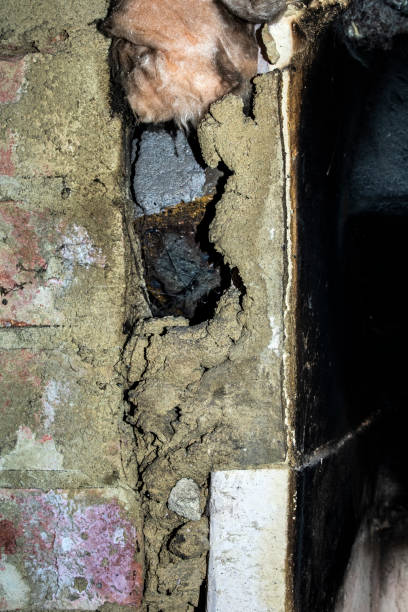 istock House Renovation Plaster Fallen Off Wall and Bare Walls DIY 1217185015