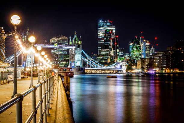 istock Tower bridge at long exposire in the night, London 1217185421