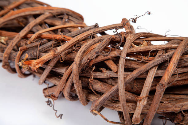 istock A braided wreath of willow rod close-up. Texture and background image on a white background. 1217188444