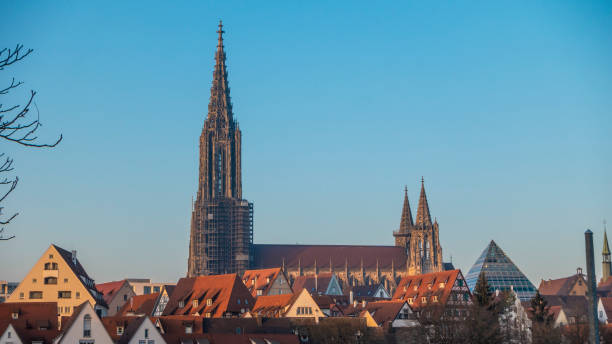 Panoramic picture of the famous cathedral in the German city of Ulm Panoramic picture of the famous cathedral in the German city of Ulm in summer ulm minster stock pictures, royalty-free photos & images