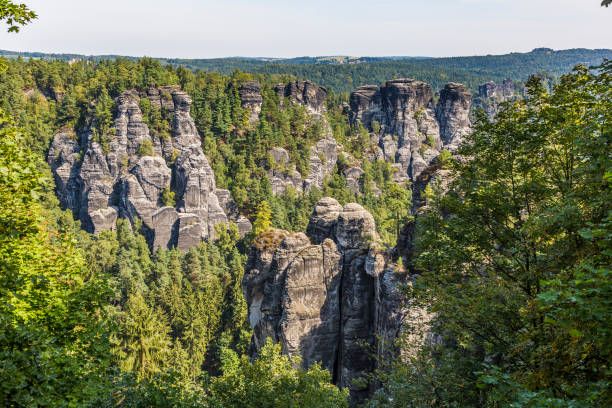 View over saxony sandstone mountains national park in summer View over saxony sandstone mountains national park in summer erzgebirge stock pictures, royalty-free photos & images