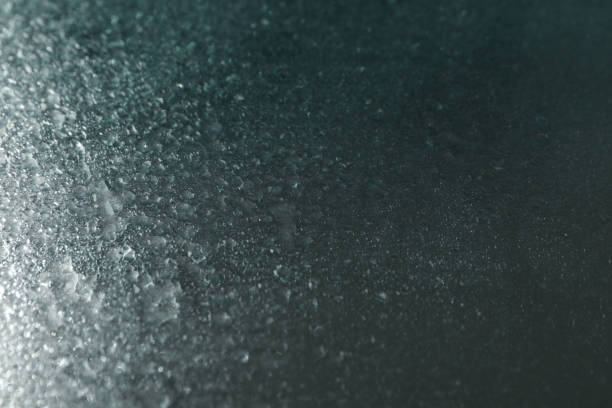 istock Wet mirror background with water, close up 1217192771