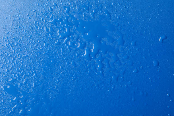 istock Blue background with water, top view. Wet background 1217194093