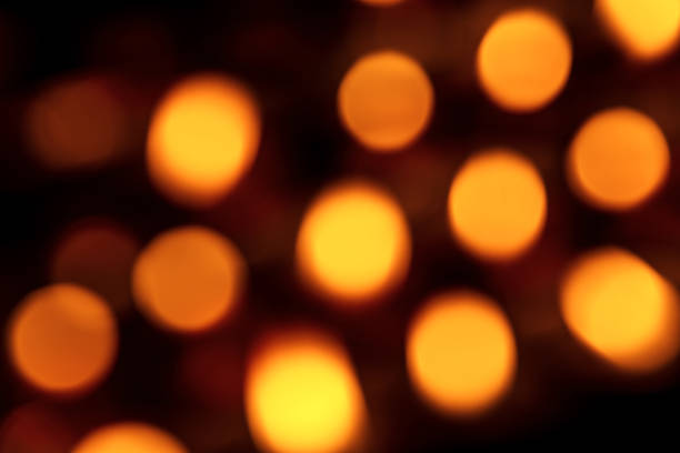 istock Votive candles out of focus - Bokeh effect 1217194120