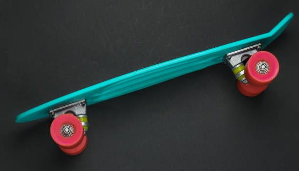 istock Penny board on a black background. Top view. 1217195509