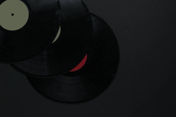 istock Vinyl records on black background. Top view 1217196110