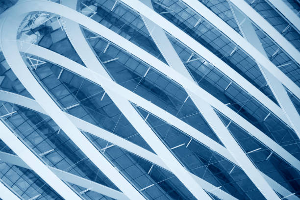 istock Grid structure resembling futuristic building fragment. Digitally rendered abstract modern architecture background with rhombic or rectangular pattern in sky blue color. 1217199396