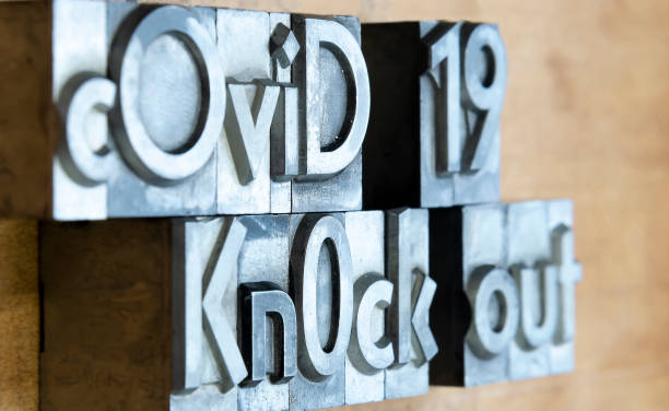 istock Covid 19 Knock out created with mobile type printing celebrating victory over pandemic 1217199515