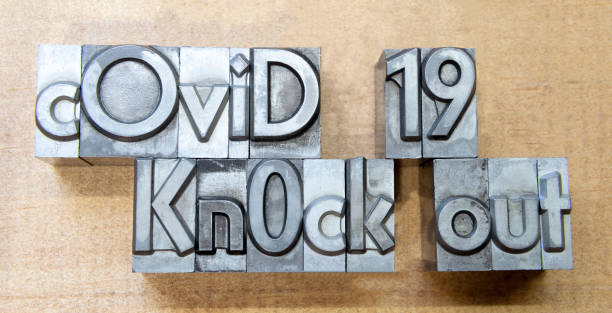 istock Knock out Covid 19 created with mobile type printing celebrating victory over pandemic 1217199526