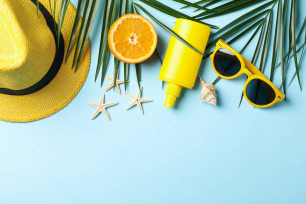 istock Summer vacation accessories on blue background, space for text 1217199664